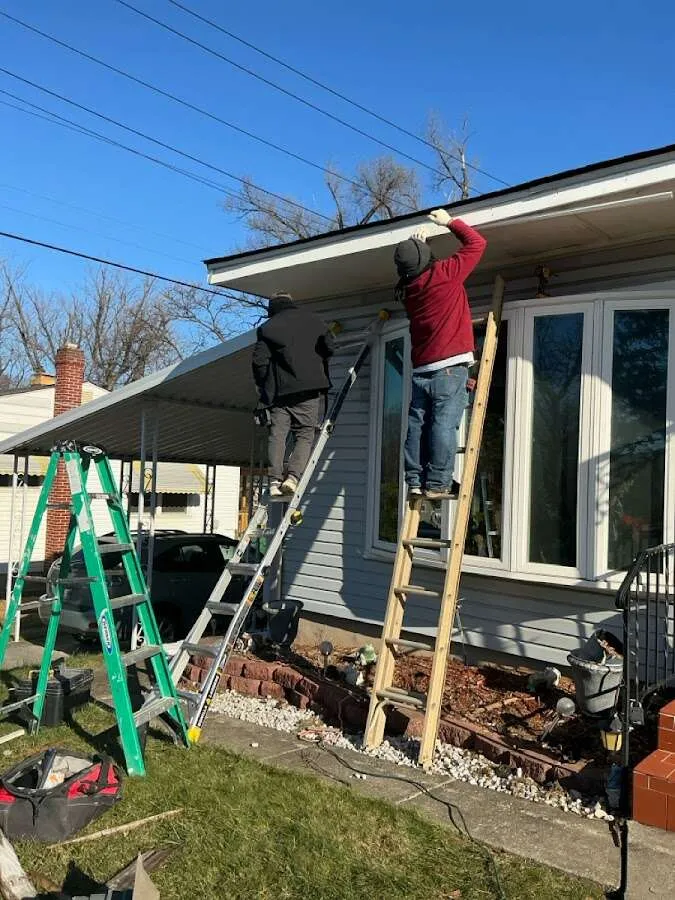 Restoration crew performing exterior repair in Boonville