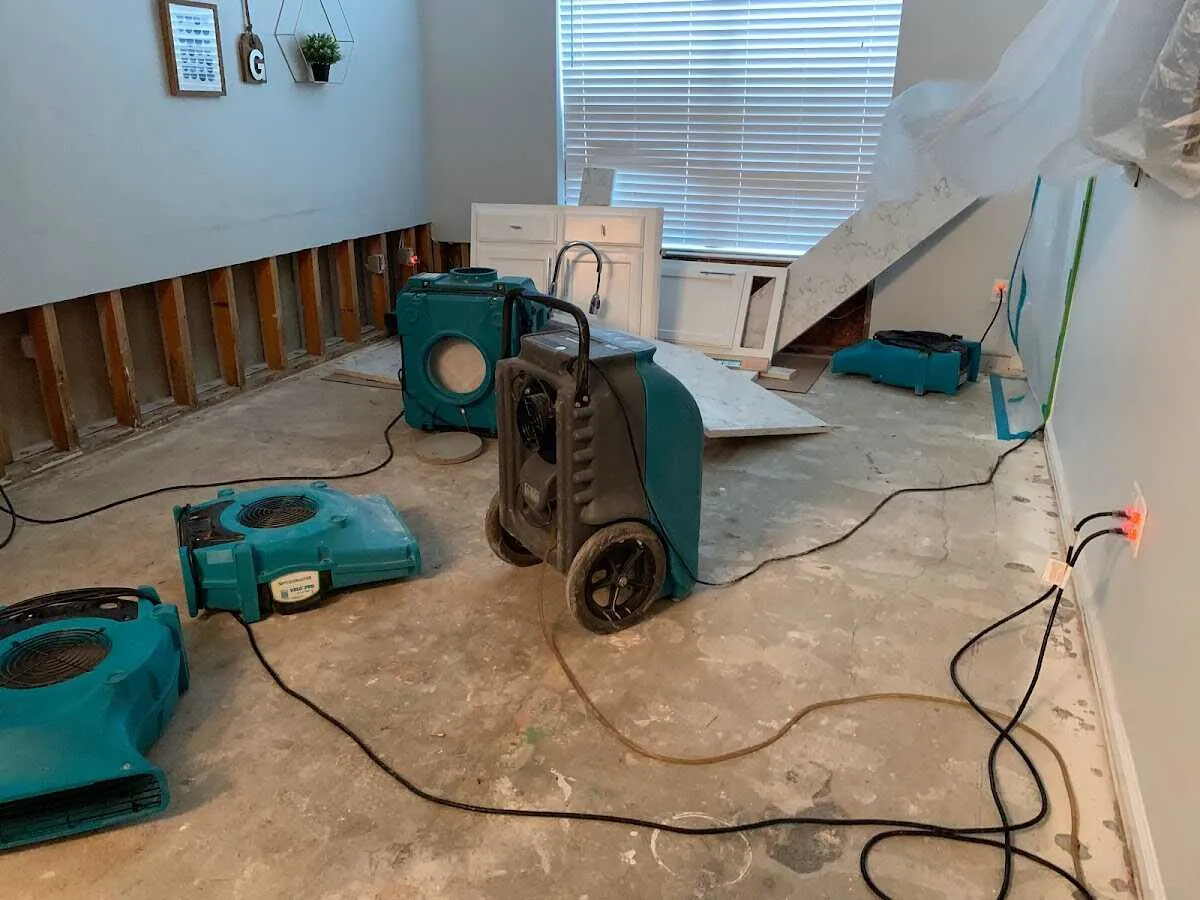 Dehumidifier in flood-cut room for Water Damage Restoration in Boonville